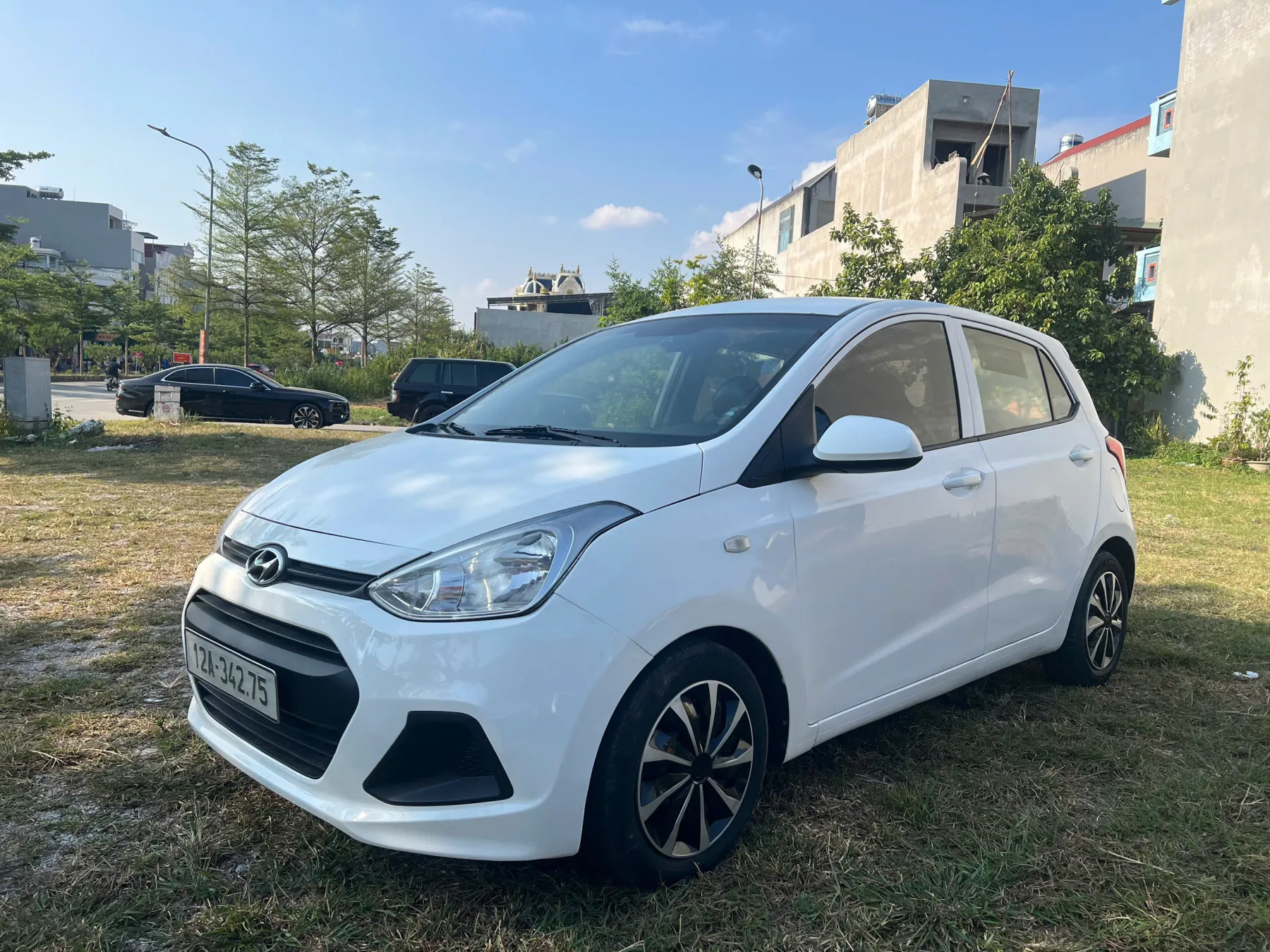 Hyundai Grand i10 2014 · Màu trắng xe rất đẹp và chất - ảnh chi tiết 1